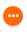 An orange circle with three white dots.